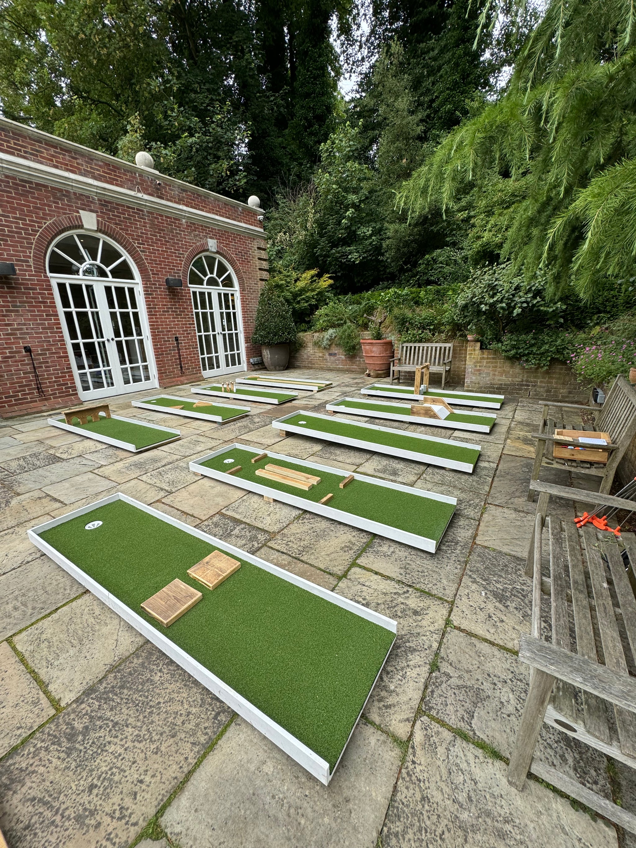 wide-shot-of-outdoor-miniature-golf-games-in-courtyard-hire-for-events